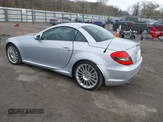2006 Mercedes-Benz SLK 55 AMG with VIN WDBWK73F66F104476, listed as a IAAI auction lot 41947845 with 87,043 mi miles and . Bid and sale history available at DreamBid. Image 3.