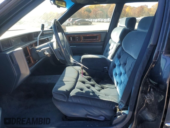 1992 Cadillac Fleetwood z VIN 1G6CB53B4N4301200, wystawiony jako Copart lot #71384554 z przebiegiem 115 430 mil mil oraz Tytuł czysty. Historia ofert i sprzedaży dostępna na DreamBid. Obrazek 7.