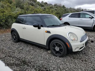 2007 MINI Hardtop with VIN WMWMF33567TT56922, listed as a Copart auction lot 56598665 with 66,605 mi miles and Salvage title. Bid and sale history available at DreamBid. Image 4.
