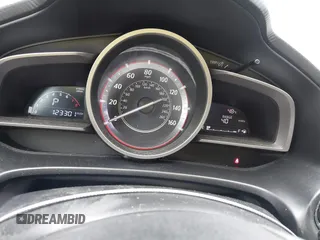 2015 Mazda 3 i Grand Touring with VIN 3MZBM1W78FM236096, listed as a IAAI auction lot 41320225 with 123,301 mi miles and . Bid and sale history available at DreamBid. Image 7.