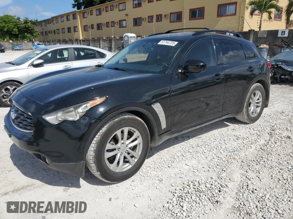 2014 Infiniti QX70 z VIN JN8CS1MU4EM451883, wystawiony jako Copart lot #61744725 z przebiegiem 60 393 mil mil oraz Czysty tytuł • Clean title. Historia ofert i sprzedaży dostępna na DreamBid. Obrazek 1.