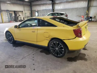 2003 Toyota Celica GT with VIN JTDDR32T930150872, listed as a Copart auction lot 76353954 with 129,294 mi miles and Salvage Title. Bid and sale history available at carsss.com. Image 2.