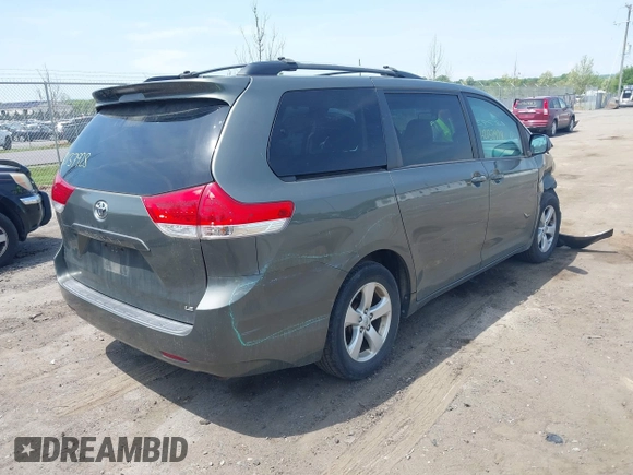 2011 Toyota Sienna LE AAS with VIN 5TDKK3DC7BS014356, listed as a IAAI auction lot 42137928 with 198,400 mi miles and . Bid and sale history available at DreamBid. Image 4.
