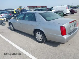 2005 Cadillac DeVille z VIN 1G6KD54Y65U192442, wystawiony jako IAAI lot #42257163 z przebiegiem 100 381 mil mil oraz . Historia ofert i sprzedaży dostępna na DreamBid. Obrazek 3.
