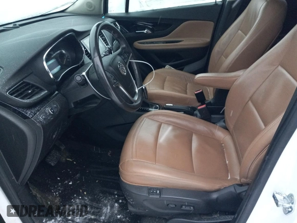 2019 Buick Encore Essence with VIN KL4CJGSM5KB738932, listed as a Copart auction lot 83087444 with 59,162 mi miles and Salvage Title. Bid and sale history available at DreamBid. Image 7.