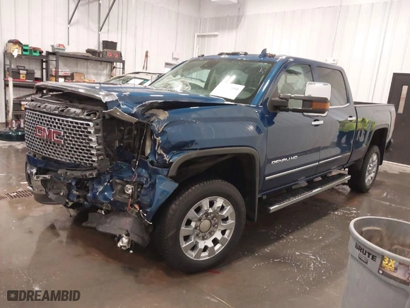 2015 GMC Sierra 2500HD available WiFi Denali with VIN 1GT120E86FF655301, listed as a IAAI auction lot 41965001 with 74,136 mi miles. Bid and sale history available at carsss.com. Image 2.