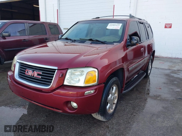 2003 GMC Envoy SLT with VIN 1GKDS13S132118361, listed as a IAAI auction lot 41909425 with 283,342 mi miles. Bid and sale history available at carsss.com. Image 2.