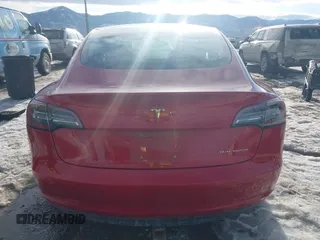 2018 Tesla Model 3 Long Range Battery with VIN 5YJ3E1EB0JF064041, listed as a IAAI auction lot 41562239 with 54,720 mi miles and . Bid and sale history available at DreamBid. Image 17.