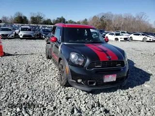 2014 MINI Countryman John Cooper Works with VIN WMWXD1C5XEWS34681, listed as a Copart auction lot 41781005 with 133,463 mi miles and Salvage Title. Bid and sale history available at DreamBid. Image 11.