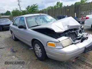 2004 Ford Crown Victoria LX z VIN 2FAHP74W74X156118, wystawiony jako IAAI lot #42203991 z przebiegiem 144 197 mil mil oraz . Historia ofert i sprzedaży dostępna na DreamBid. Obrazek 1.