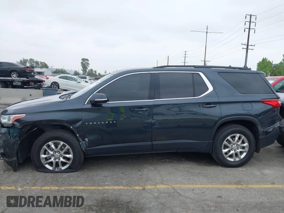 2020 Chevrolet Traverse LT Cloth with VIN 1GNERGKWXLJ320261, listed as a IAAI auction lot 42094336 with 51,063 mi miles. Bid and sale history available at carsss.com. Image 20.