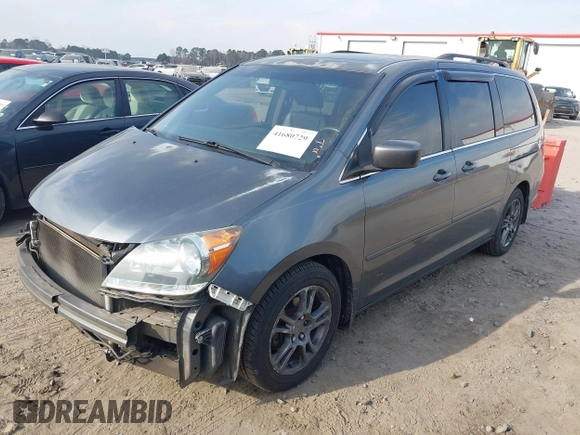 2010 Honda Odyssey EX-L with VIN 5FNRL3H7XAB099821, listed as a IAAI auction lot 41680729 with 217,458 mi miles and . Bid and sale history available at DreamBid. Image 2.