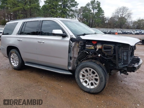 2015 GMC Yukon SLT with VIN 1GKS1BKC7FR628736, listed as a IAAI auction lot 41709926 with 130,254 mi miles. Bid and sale history available at carsss.com. Image 1.