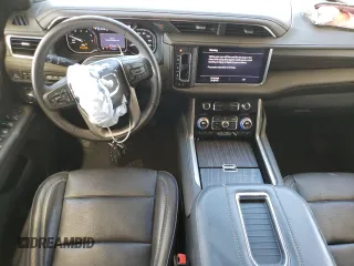 2021 GMC Yukon Denali with VIN 1GKS2DKLXMR387681, listed as a Copart auction lot 46830485 with 77,628 mi miles and Salvage Title. Bid and sale history available at carsss.com. Image 8.