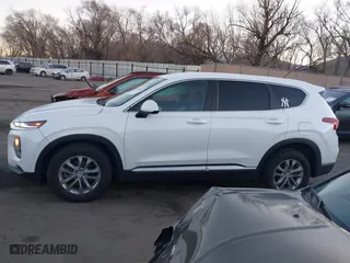 2019 Hyundai Santa Fe SE with VIN 5NMS23AD9KH077362, listed as a IAAI auction lot 41890584 with 132,476 mi miles. Bid and sale history available at carsss.com. Image 14.