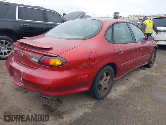 1997 Ford Taurus z VIN 1FALP54N7VA137035, wystawiony jako IAAI lot #41778551 z przebiegiem 137 025 mil mil oraz . Historia ofert i sprzedaży dostępna na DreamBid. Obrazek 4.
