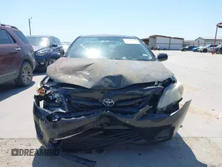 2011 Toyota Corolla L with VIN JTDBU4EE9BJ096586, listed as a IAAI auction lot 41992120 with 201,297 mi miles. Bid and sale history available at carsss.com. Image 13.
