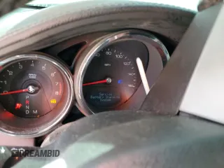 2010 Cadillac CTS z VIN 1G6DA5EG6A0115370, wystawiony jako Copart lot #54919115 z przebiegiem Nie podano mil oraz Szkoda całkowita • Salvage title. Historia ofert i sprzedaży dostępna na DreamBid. Obrazek 9.