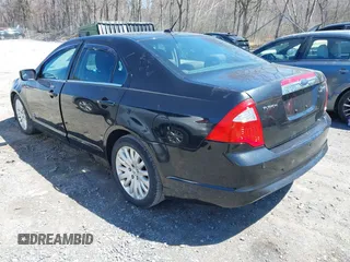 2010 Ford Fusion Hybrid with VIN 3FADP0L33AR294150, listed as a IAAI auction lot 42057023 with 197,497 mi miles. Bid and sale history available at carsss.com. Image 3.