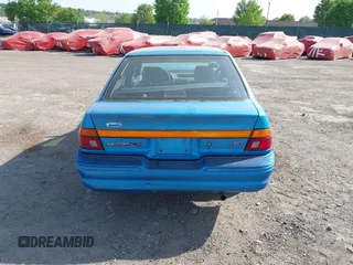 1994 Ford Escort z VIN 1FARP14J1RW244851, wystawiony jako IAAI lot #42157786 z przebiegiem 73 095 mil mil oraz . Historia ofert i sprzedaży dostępna na DreamBid. Obrazek 17.
