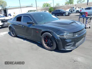 2019 Dodge Charger SRT Hellcat z VIN 2C3CDXL91KH749445, wystawiony jako IAAI lot #42300340 z przebiegiem 68 224 mil mil oraz . Historia ofert i sprzedaży dostępna na DreamBid. Obrazek 1.