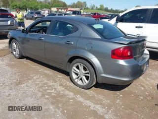 2013 Dodge Avenger SXT with VIN 1C3CDZCG7DN585431, listed as a IAAI auction lot 41975228 with 152,703 mi miles and . Bid and sale history available at carsss.com. Image 3.