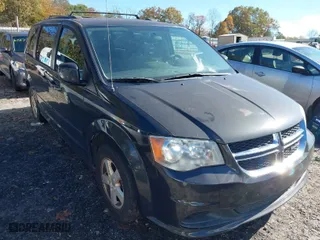 2012 Dodge Grand Caravan SXT with VIN 2C4RDGCG1CR121725, listed as a IAAI auction lot 40914801 with NaN miles. Bid and sale history available at carsss.com. Image 1.