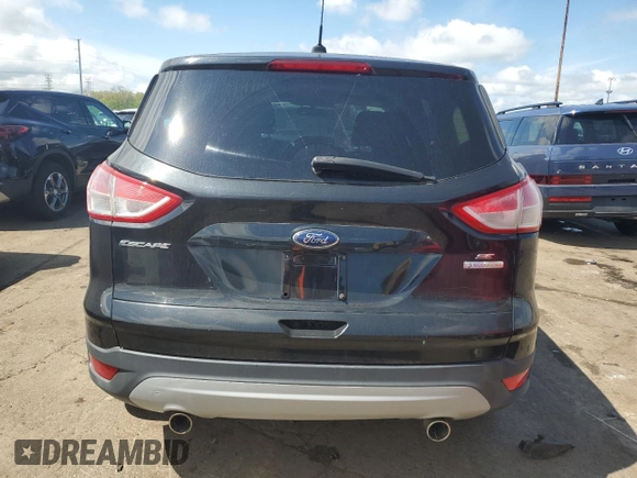 2013 Ford Escape SE with VIN 1FMCU0GX4DUC74025, listed as a Copart auction lot 56251735 with 248,245 mi miles and Clean Title. Bid and sale history available at DreamBid. Image 6.