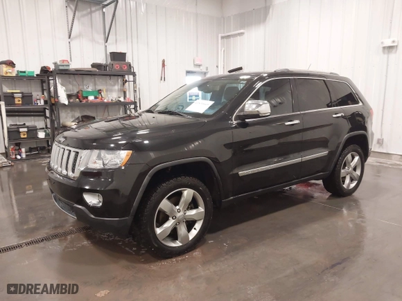 2011 Jeep Grand Cherokee Overland with VIN 1J4RR6GT7BC607735, listed as a IAAI auction lot 41830669 with 98,161 mi miles. Bid and sale history available at carsss.com. Image 20.