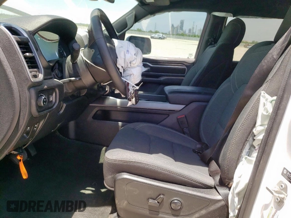 2023 Ram 1500 Big Horn with VIN 1C6SRFFT7PN698730, listed as a Copart auction lot 56967445 with 30,514 mi miles and Salvage title. Bid and sale history available at DreamBid. Image 7.