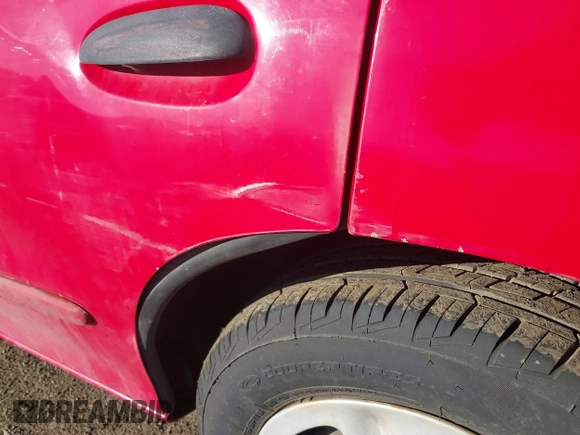 2002 Chevrolet Cavalier LS z VIN 1G1JF524X27125638, wystawiony jako IAAI lot #40502749 z przebiegiem Nie podano mil oraz . Historia ofert i sprzedaży dostępna na DreamBid. Obrazek 13.