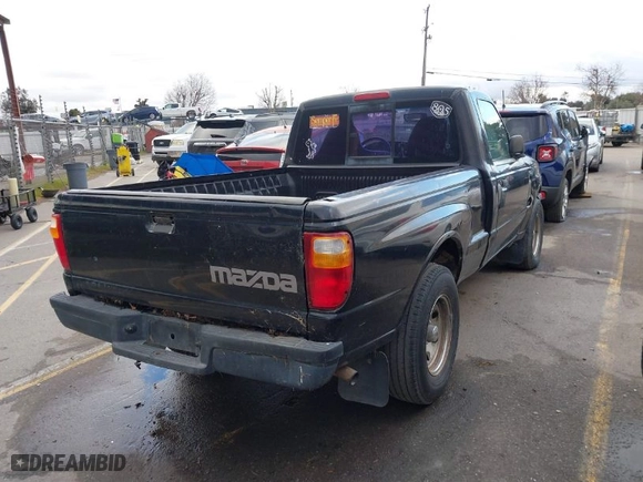 2003 Mazda B-Series 2WD Truck SX with VIN 4F4YR12D23TM09609, listed as a IAAI auction lot 41571323 with 194,860 mi miles. Bid and sale history available at carsss.com. Image 4.