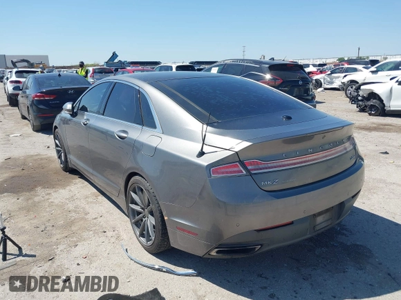 2014 Lincoln MKZ z VIN 3LN6L2G92ER835456, wystawiony jako IAAI lot #41985573 z przebiegiem 174 080 mil mil oraz . Historia ofert i sprzedaży dostępna na DreamBid. Obrazek 3.