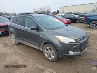 2016 Ford Escape SE z VIN 1FMCU9GX3GUC01107, wystawiony jako IAAI lot #41138054 z przebiegiem 124 037 mil mil oraz . Historia ofert i sprzedaży dostępna na DreamBid. Obrazek 1.