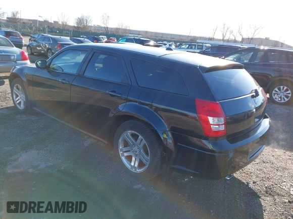 2005 Dodge Magnum RT with VIN 2D4GV58235H682753, listed as a IAAI auction lot 41814817 with 100,246 mi miles. Bid and sale history available at carsss.com. Image 3.