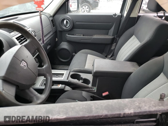 2010 Dodge Nitro SE with VIN 1D4PU2GK3AW146299, listed as a Copart auction lot 76261334 with 140,721 mi miles and Salvage Title. Bid and sale history available at DreamBid. Image 7.