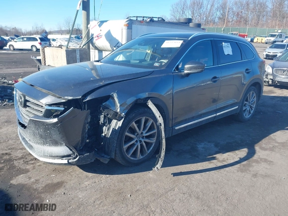 2016 Mazda CX-9 Signature with VIN JM3TCBEY3G0104689, listed as a IAAI auction lot 41257053 with 116,486 mi miles. Bid and sale history available at carsss.com. Image 17.
