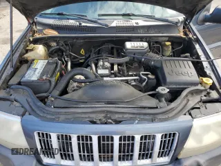 2004 Jeep Grand Cherokee Laredo with VIN 1J4GX48S24C216941, listed as a Copart auction lot 55584785 with 279,710 mi miles and Salvage title. Bid and sale history available at DreamBid. Image 12.