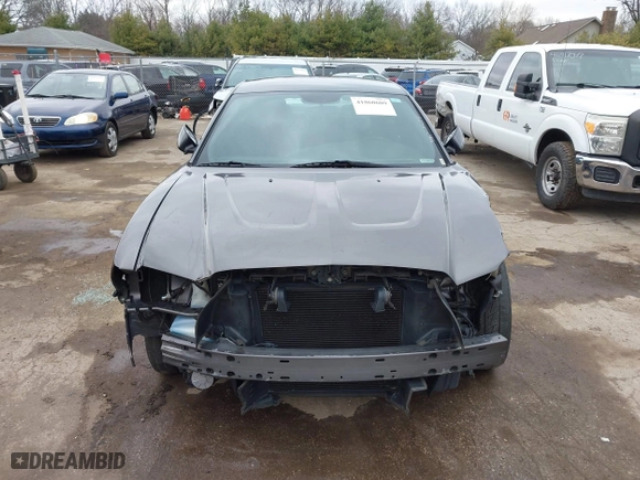 2014 Dodge Charger SE with VIN 2C3CDXBG8EH357664, listed as a IAAI auction lot 41860609 with 94,918 mi miles. Bid and sale history available at carsss.com. Image 12.