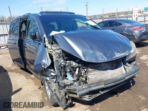 2010 Honda Odyssey EX-L with VIN 5FNRL3H64AB025785, listed as a IAAI auction lot 41889078 with 199,714 mi miles. Bid and sale history available at carsss.com. Image 1.