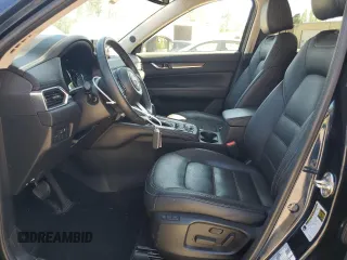 2019 Mazda CX-5 Grand Touring with VIN JM3KFBDMXK0540725, listed as a Copart auction lot 52395185 with 33,838 mi miles and Salvage Title. Bid and sale history available at carsss.com. Image 7.