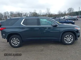 2018 Chevrolet Traverse LT Cloth z VIN 1GNEVGKW7JJ156198, wystawiony jako IAAI lot #41909259 z przebiegiem 82 719 mil mil oraz . Historia ofert i sprzedaży dostępna na DreamBid. Obrazek 14.