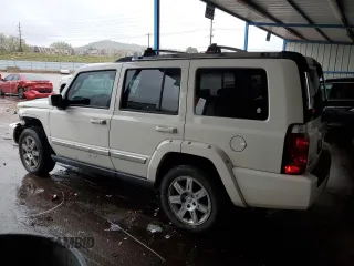 2010 Jeep Commander Limited with VIN 1J4RG5GT0AC137563, listed as a Copart auction lot 54178235 with 146,196 mi miles and Salvage title. Bid and sale history available at DreamBid. Image 2.