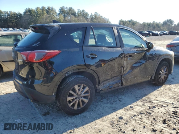 2016 Mazda CX-5 Sport with VIN JM3KE2BE1G0629430, listed as a Copart auction lot 82442654 with 130,289 mi miles and Salvage Title. Bid and sale history available at DreamBid. Image 3.