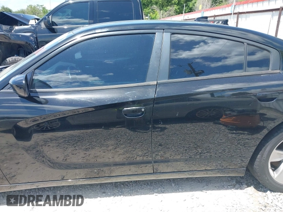 2015 Dodge Charger SXT with VIN 2C3CDXHG2FH852208, listed as a IAAI auction lot 42120021 with 156,486 mi miles and . Bid and sale history available at DreamBid. Image 14.