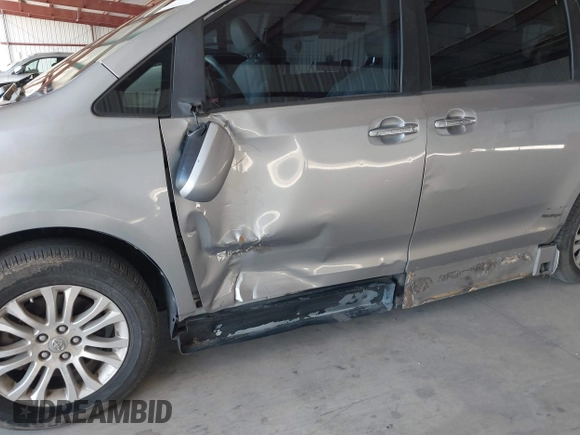 2011 Toyota Sienna XLE AAS with VIN 5TDYK3DC0BS107522, listed as a IAAI auction lot 42207305 with 171,857 mi miles and . Bid and sale history available at DreamBid. Image 6.