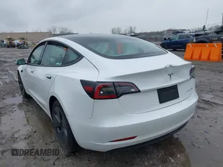 2022 Tesla Model 3 Long Range with VIN 5YJ3E1EB6NF272009, listed as a IAAI auction lot 41984154 with 12,651 mi miles and . Bid and sale history available at DreamBid. Image 3.