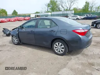 2015 Toyota Corolla L with VIN 2T1BURHE1FC381115, listed as a IAAI auction lot 42088980 with 203,493 mi miles and . Bid and sale history available at DreamBid. Image 3.
