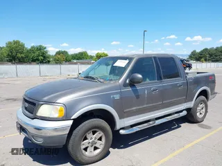 2003 Ford F-150 XLT with VIN 1FTRW08L63KD17116, listed as a IAAI auction lot 42811062 with Not provided miles and . Bid and sale history available at DreamBid. Image 2.