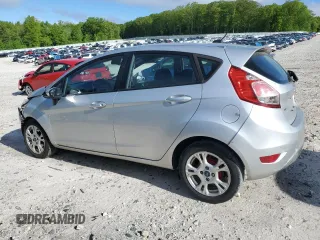 2015 Ford Fiesta SE z VIN 3FADP4EJ3FM115449, wystawiony jako Copart lot #57408015 z przebiegiem 175 083 mil mil oraz Czysty tytuł • Clean title. Historia ofert i sprzedaży dostępna na DreamBid. Obrazek 2.